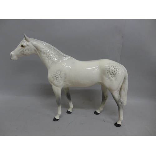 613 - A large Beswick dapple grey racehorse, 28.5cm, very small chip on the tip of the right ear