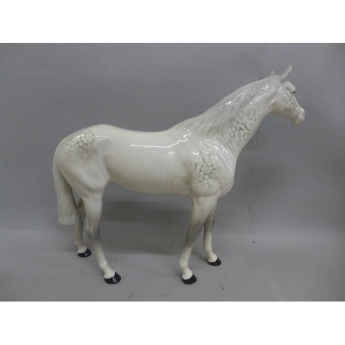 613 - A large Beswick dapple grey racehorse, 28.5cm, very small chip on the tip of the right ear