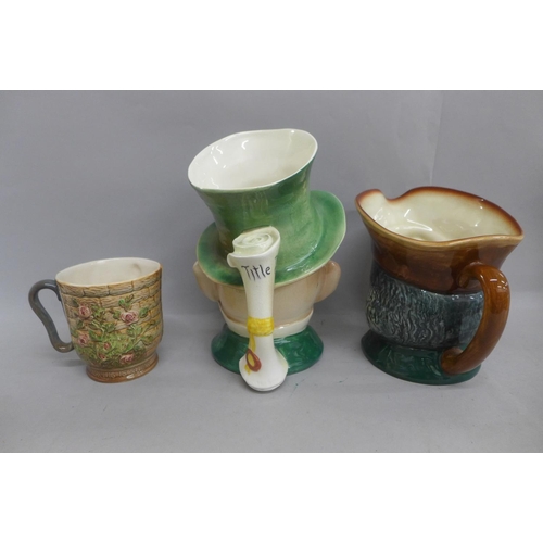 615 - A large Royal Doulton The Vicar of Bray character jug, a Beswick Micawber character jug and a Beswic... 