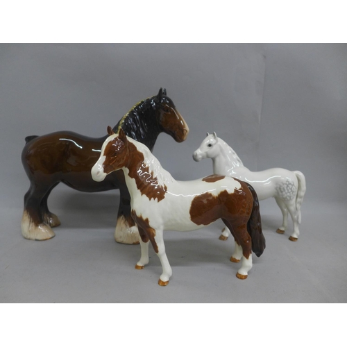 617 - A Beswick shire horse, a Beswick brown and white horse and a Beswick dappled grey horse