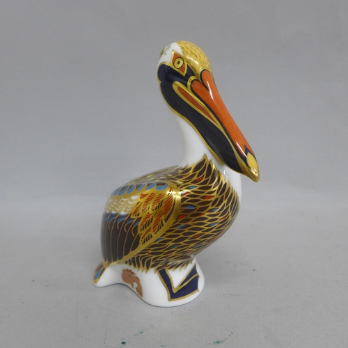 638 - A Royal Crown Derby Pelican paperweight with silver stopper