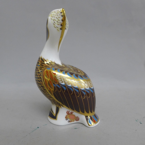 638 - A Royal Crown Derby Pelican paperweight with silver stopper