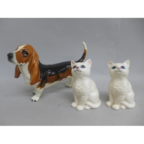 640 - A Beswick Bassett Hound and two Beswick Kittens, one a/f, chip to ear