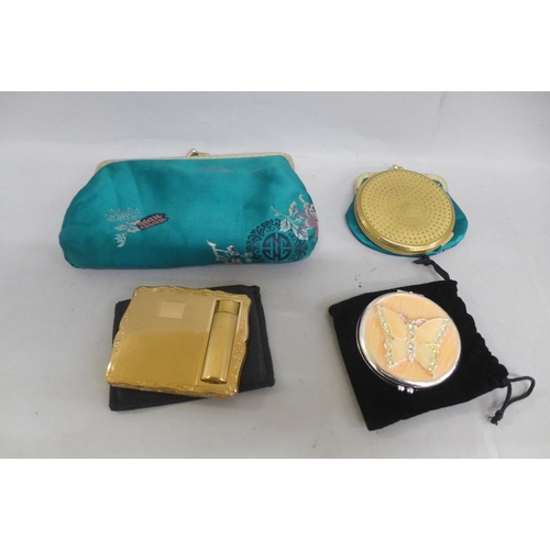 645 - A Chinese silk bag and purse with two Stratton compacts and a compact mirror - all used