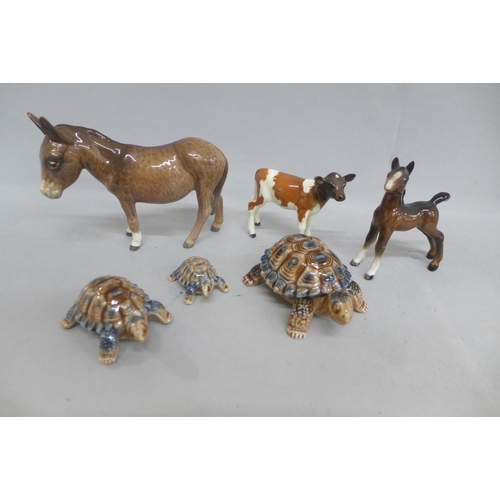 648 - A Beswick donkey, calf, foal and three Wade tortoises