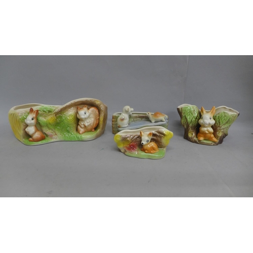 664 - Four Hornsea Fauna posy vases