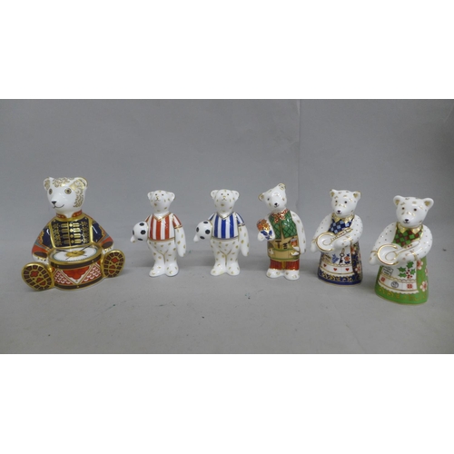 669 - Six Royal Crown Derby Bear paperweights - Full size Drummer Teddy, 14cm, gold stopper and red Royal ... 