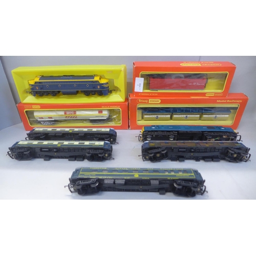 684 - A collection of Hornby, Tri-ang and Playcraft 00 gauge coaches and wagons