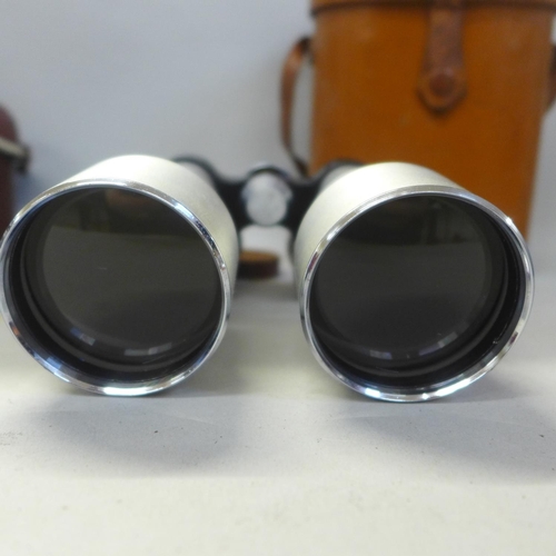 688 - A pair of Petlux 12x50 binoculars and a Kodak camera