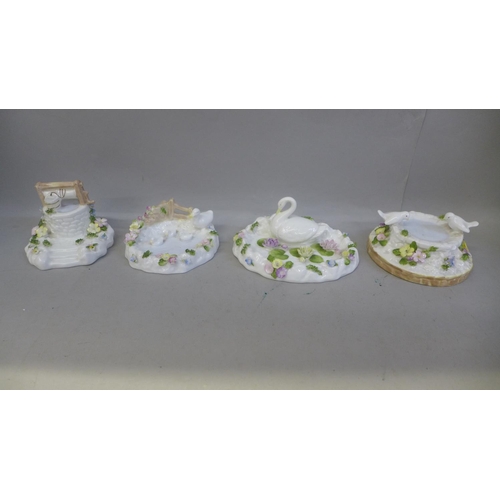 689 - Four Coalport ornaments, one a/f (hairline)