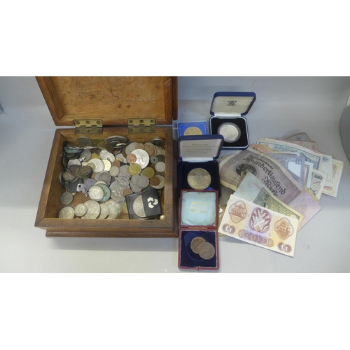 705 - An oak box with coins, bank notes, etc.