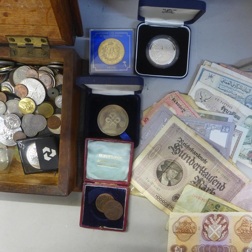 705 - An oak box with coins, bank notes, etc.