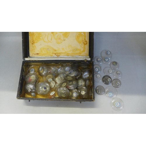 710 - A box of pocket watch crystals