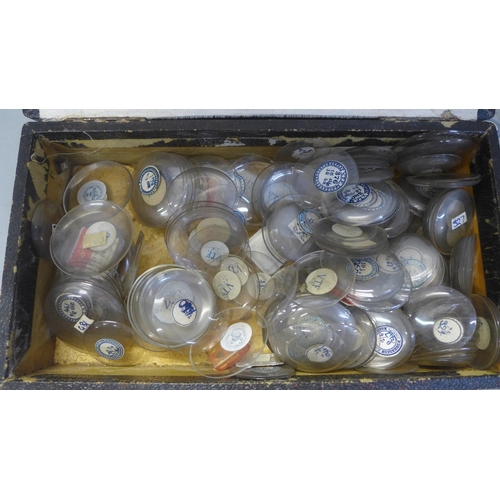 710 - A box of pocket watch crystals