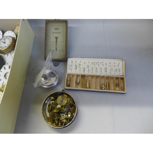 716 - A box of pocket watch movements and parts, etc.