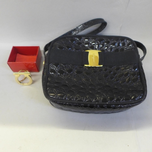 719 - A Salvatore Ferragamo mock crocodile handbag and a scarf ring