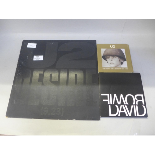 726 - A David Bowie limited edition CD, Black Tie, White Noise number 187, a U2 CD and a U2 Desire 12