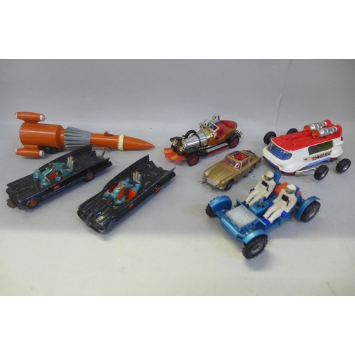 741 - A Dinky Toys Lunar Roving Vehicle, a Corgi Lunar Bug, two Corgi Batmobiles, a Chitty Chitty Bang Ban... 