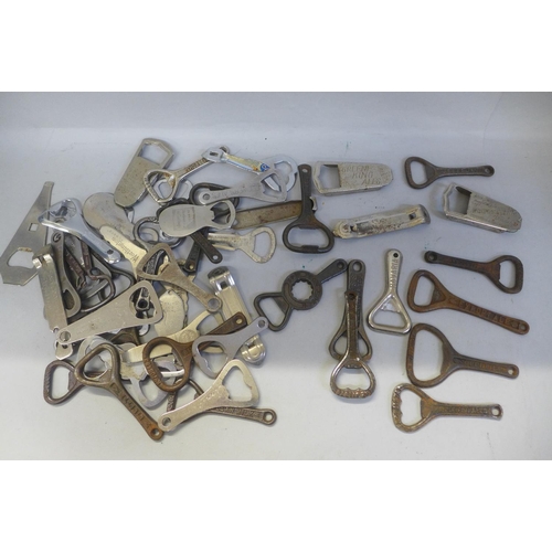 742 - Approximately fifty vintage advertising bottle openers