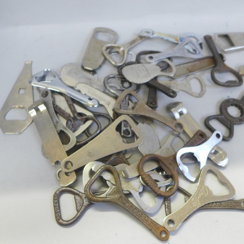 742 - Approximately fifty vintage advertising bottle openers