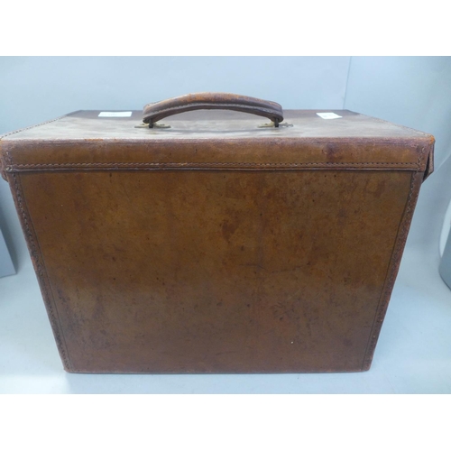 780 - A leather hat box