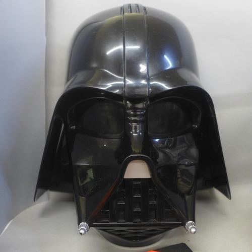 782 - A Star Wars talking plush character, a Darth Vader voice changing mask, two Star Wars books and a Dr... 
