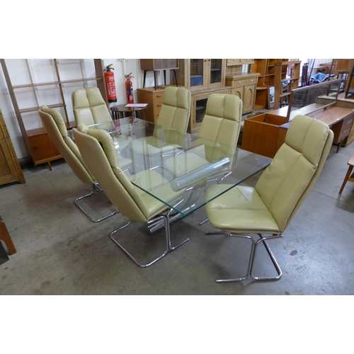 100a - An Italian chrome and glass topped dining table and  six Pieff chrome and cream leather chairs