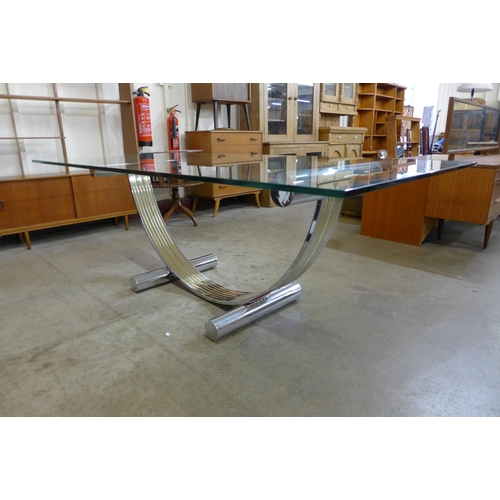 100a - An Italian chrome and glass topped dining table and  six Pieff chrome and cream leather chairs