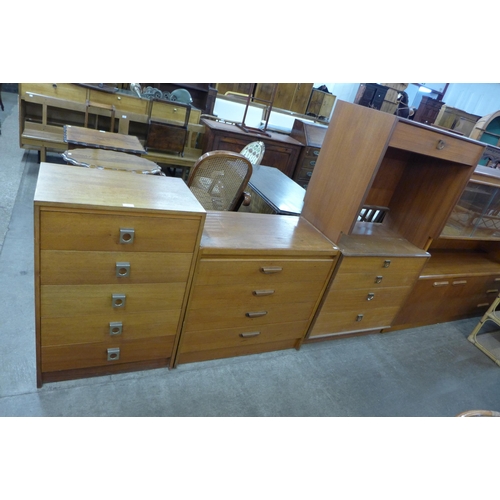 103 - Three teak chests of drawers and a teak desk