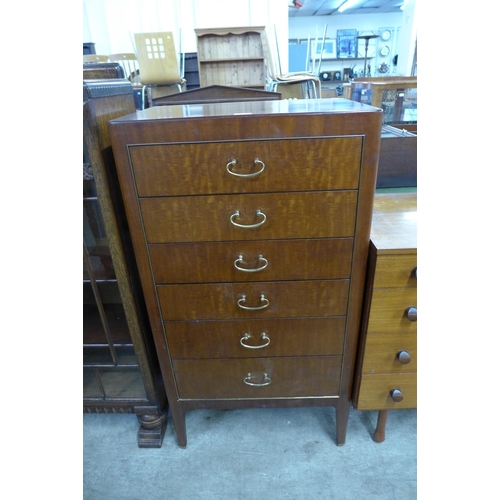 110 - A teak chest of drawers