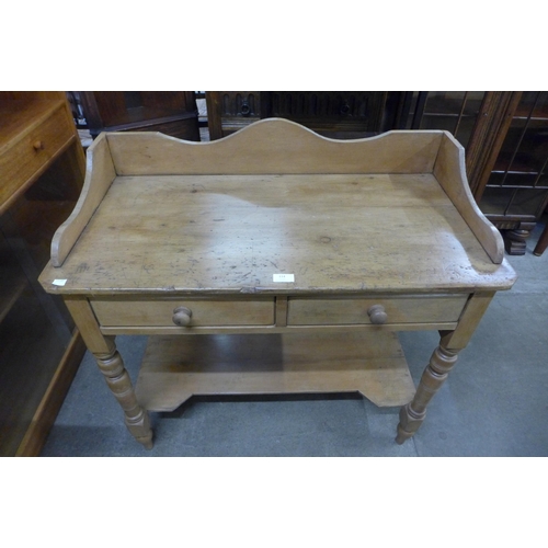 114 - A Victorian pine two drawer washstand