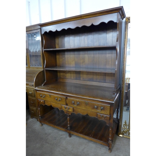 132a - A George III style Ipswich oak dresser