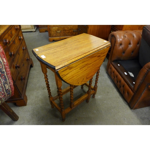 137 - An oak barleytwist gateleg table