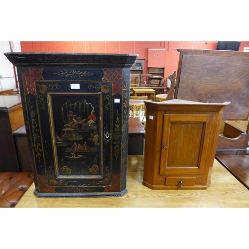 140 - A Victorian black Japanned wall hanging corner cupboard and one other