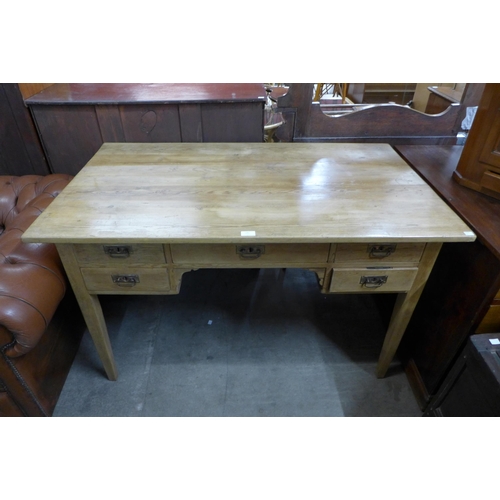 141 - A French pine writing table