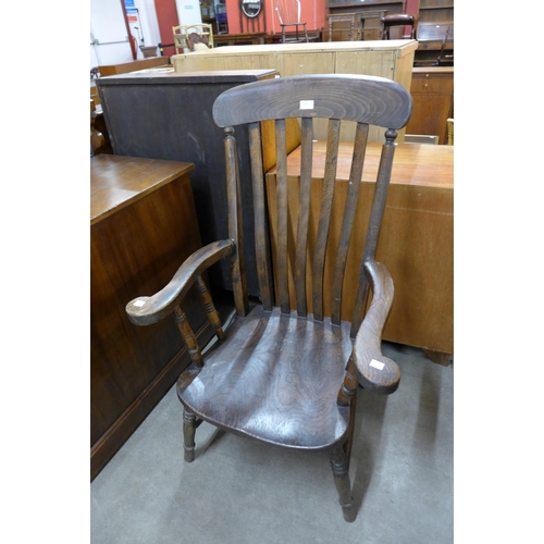 145 - A Victorian elm and beech farmhouse armchair