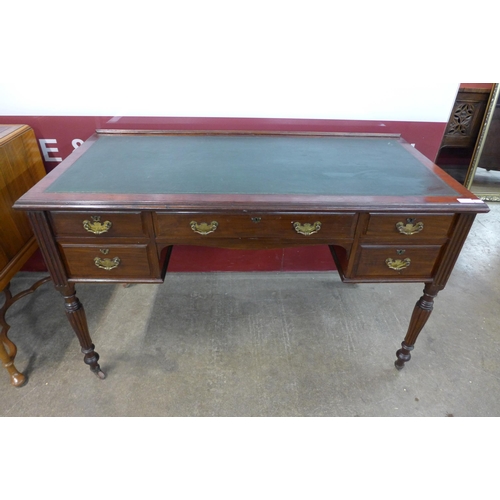 15 - A late Victorian Shapland & Petter of Barnstable mahogany and green leather topped writing table