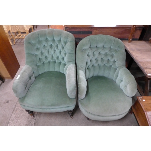 154 - A pair of similar Victorian upholstered green fabric button back armchairs