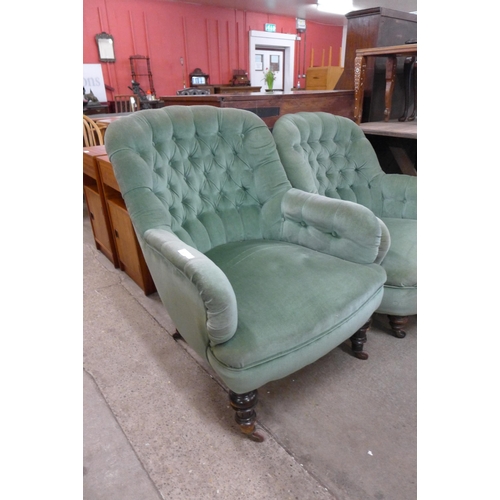 154 - A pair of similar Victorian upholstered green fabric button back armchairs