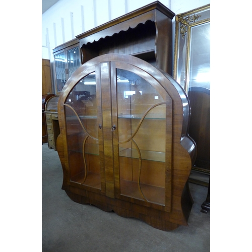 26 - An Art Deco walnut display cabinet