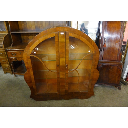 26 - An Art Deco walnut display cabinet