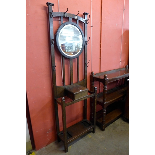 28 - An early 20th Century oak hallstand