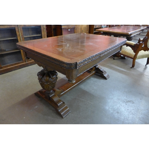 29 - A 17th Century style carved oak draw-leaf table, 78cms h, 137cms l, 99cms w