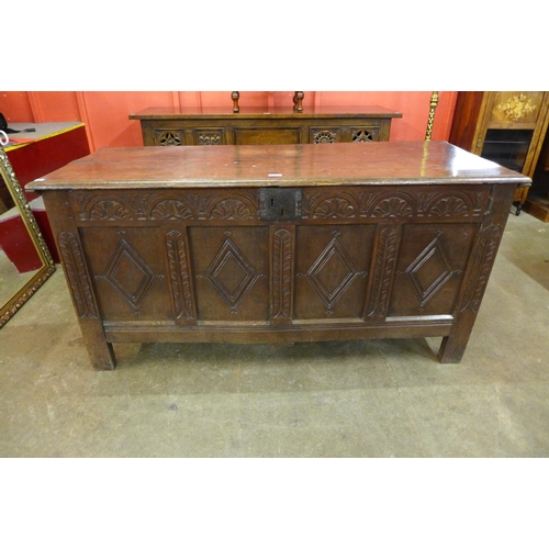 3 - A Charles II carved oak coffer