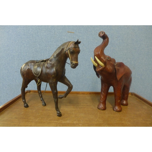 347 - A small leather horse and a leather elephant