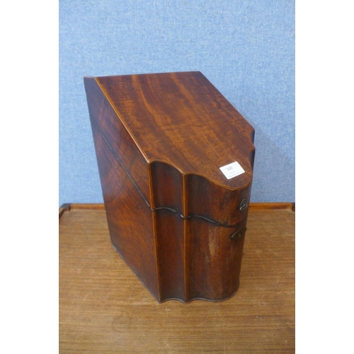 349 - A George III mahogany serpentine cutlery box