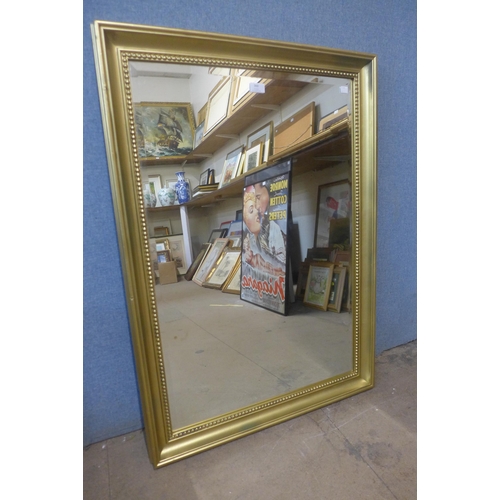 360 - A gilt framed mirror