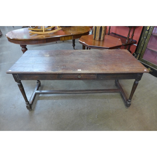 38 - A 17th Century oak single drawer refectory table