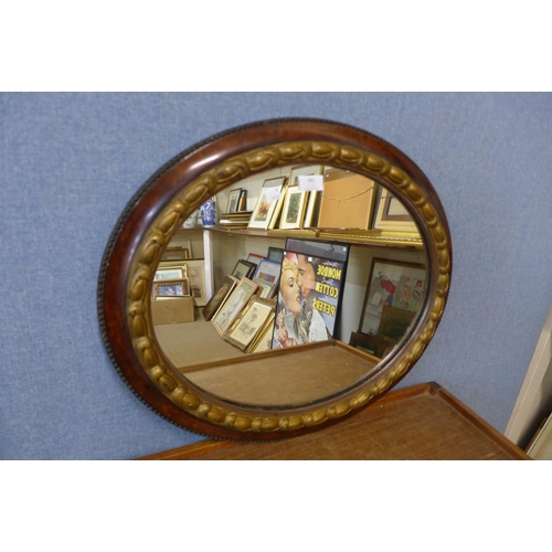 381 - An Edward VII simulated walnut and parcel gilt framed mirror