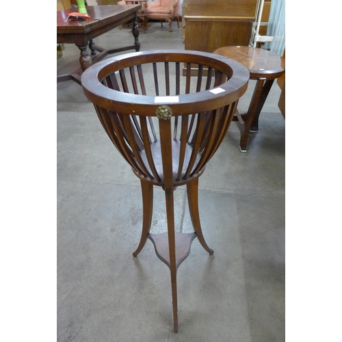 39 - An Edward VII mahogany jardiniere on stand